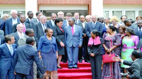 •PRESIDENT Michael Sata poses for a group photograph with heads of diplomatic missions accredited to Zambia following a closed-door meeting at State House in Lusaka yesterday. Picture by STEPHEN KAPAMBWE