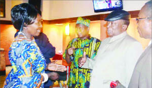 CHIEF Chibesakunda (in black cap) stressing a point as Gender and Child Development Minister Inonge Wina (left), Chief Mporokoso (in traditional attire), and House of Chiefs clerk Michael Pwete (right) listen. This was after the minister officiated at a consultative meeting with traditional leaders in Lusaka yesterday. Picture by CHUSA SICHONE.