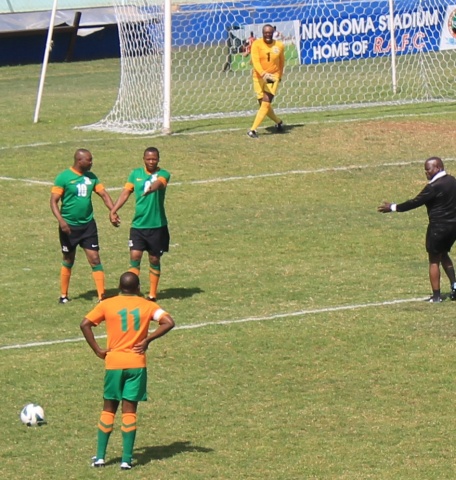 Familiar posture! Kalu stands with hands akimbo as he prepares to take a free-kick