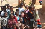 Lonnie Hackett ’14 with school children in Zambia