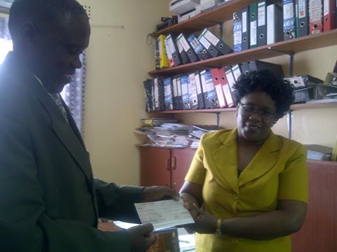 PICTURE: NAMWIANGA MISSION CEO GEORGE PHIRI RECEIVING K50,000 CHEQUE FROM FBZ SOUTHERN PROVINCE SENIOR MANAGER FOR OPERATIONS COMPLIANCE AND BUSINESS DEVELOPMENT, MAINGA PICTURE: NAMWIANGA MISSION CEO GEORGE PHIRI RECEIVING K50,000 CHEQUE FROM FBZ SOUTHERN PROVINCE SENIOR MANAGER FOR OPERATIONS COMPLIANCE AND BUSINESS DEVELOPMENT, MAINGA