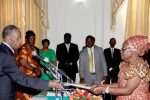 President Sata receives an affidavit of Oath from Zambia’s Ambassador to Malawi Salome Mwananshiku during the Swearing-in-ceremony at State House on May 30,2014 -Picture by THOMAS NSAMA