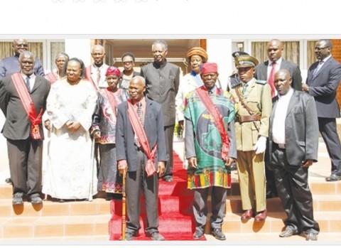PRESIDENT Sata (centre back row) and acting Chief Justice Lombe Chibesakunda (second from left second row) pose honorees after the investiture ceremony at State House yesterday. – Picture by MACKSON WASAMUNU. PRESIDENT Sata (centre back row) and acting Chief Justice Lombe Chibesakunda (second from left second row) pose honorees after the investiture ceremony at State House yesterday. – Picture by MACKSON WASAMUNU.