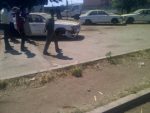Smashed cars from the #chibolya Raid.#Zambia – Rogers Mumba