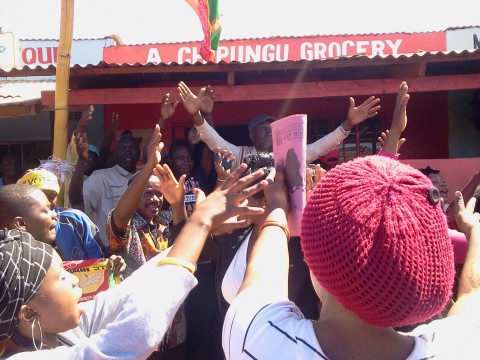 UPND receiving defectors from PF and MMD at their Office in Kasama Chikumanino Market ( 25 June,2014)-