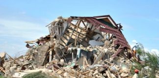 houses built on illegally acquired plots in Mindolo North Township in Kitwe have been demolished