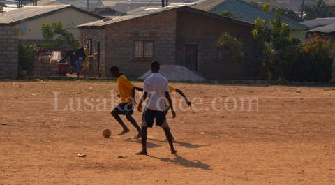 Boys playing Football