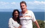 British victim- David Morgan, right, was killed along with 115 others when his flight crashed in Mali, north Africa. He is pictured above at Lake Kariba in Zambia