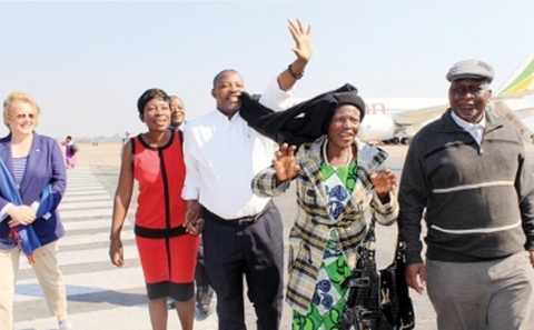 FELIX Ngoma (centre) being welcomed by UN resident coordinator Janet Rogan (left), his wife Mary (second left), his mother Halesi Chima, and Ministry of Foreign Affairs permanent secretary George Zulu Picture by ANGELA MWENDA FELIX Ngoma (centre) being welcomed by UN resident coordinator Janet Rogan (left), his wife Mary (second left), his mother Halesi Chima, and Ministry of Foreign Affairs permanent secretary George Zulu at Kenneth Kaunda International Airport in Lusaka yesterday. - Picture by ANGELA MWENDA