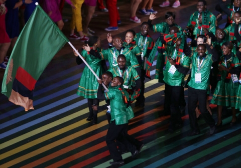 Flag bearer and judoka Punza Mathews of Zambia during the Opening Ceremony for the Glasgow 2014 Commonwealth Games at Celtic Park on July 23