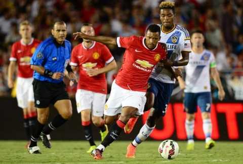 Manchester United's Nani vies for the ball with Michael Keane of the LA Galaxyduring their match in Pasadena, California, on July 23, 2014 (AFP Photo/Frederic J Brown)