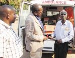 DEPUTY Minister of Health Chitalu Chilufya (centre) presents an Ambulance to Chief Nabwalya (right) of the Bisa speaking people in Mpika on Thursday. Looking on is Mfuwe Member of Parliament Mwimba Malama. – Picture by NANCY SIAME.