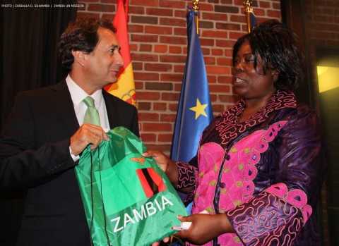 Minister of Tourism and Arts Jean Kapata giving a Zambia’s Golden Jubilee souvenir to Spain's Casa África General-Director Luis Padrón (left) on 8-Sept-2014 in New York. PHOTO | Chibaula D. Silwamba | Zambia UN Mission