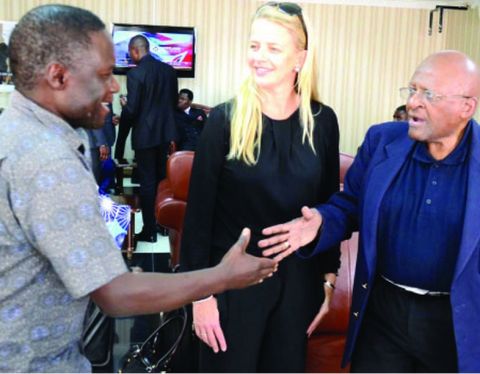 GIRLS Not Brides, founder Archbishop Desmond Tutu (right) greets Deputy Inspector General of Police Solomon Jere (left) on arrival at Kenneth Kaunda International Airport. Looking on is Princess Mabel van Oranje. Picture by CLEVER ZULU GIRLS Not Brides, founder Archbishop Desmond Tutu (right) greets Deputy Inspector General of Police Solomon Jere (left) on arrival at Kenneth Kaunda International Airport. Looking on is Princess Mabel van Oranje. Picture by CLEVER ZULU