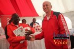 Ministry of Education and Early Childhood  PS Dr Patrick Nkanza receiving from Zanaco MD Dick Bruce some soccer balls meant to selected Lusaka based primary schools ,the ceremony took place at the ZANACO Sunset Stadium