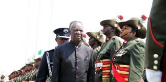 President Sata inspects a guard of honour during the opening of parliament on September 19, 2014 -Picture by THOMAS NSAMA