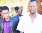 "Bobby East" ROBERT Chunga (left) leaving the Lusaka magistrate’s court yesterday. Picture by CHUSA SICHONE
