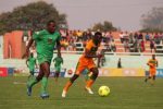 Zambia U20 defender Kayawe Kapota takes the ball away from Malawi’s Shumacher Kuwali #fazfootball