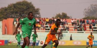 Zambia U20 defender Kayawe Kapota takes the ball away from Malawi's Shumacher Kuwali #fazfootball