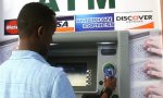 A Somali man uses the first-ever cash machine in Mogadishu. Photograph: Abdulfitah Hashi Nor/AFP/Getty Images