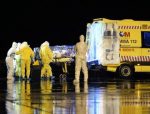 A Spanish Defense Ministry photo shows aid workers and doctors transferring Catholic missionary Manuel Garcia Viejo, who contracted the deadly Ebola virus, upon his arrival in Spain on September 22, 2014 (AFP Photo/)