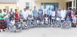 A group photo of the children recipients of wheelchairs, parents, Management of Cardinal Distributors ,  Sisters and Members of staff of the Zambia Italian Hospital