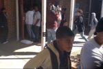 It's a chaotic scene at Hazlehurst Middle School as parents try to pull their children out of class