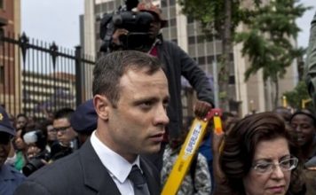 Oscar Pistorius leaves North Gauteng high court on Wednesday. Photograph: Charlie Shoemaker/Getty Images