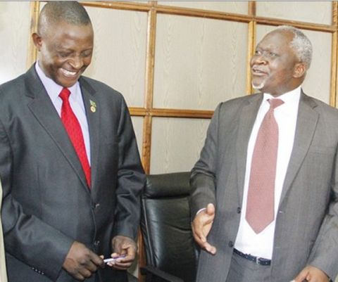 Zambia’s Foreign Affairs Permanent Secretary George Zulu (right)