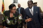 Joice Mujuru (L) denies plotting to kill President Robert Mugabe(Getty)