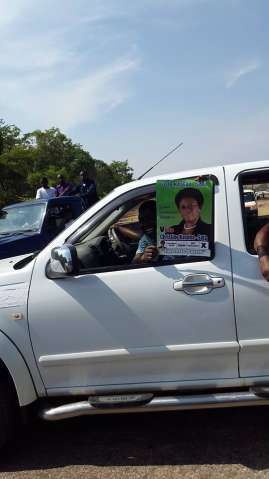 Kaseba's supporters show off supporters.