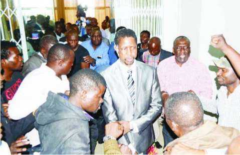 PF Secretary General Edgar Lungu surrounded by party members as he leaves Government Complex yesterday after a Central Committee meeting. PF Secretary General Edgar Lungu surrounded by party members as he leaves Government Complex yesterday after a Central Committee meeting.