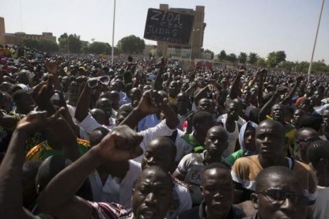 Pro-democracy protesters chant slogans against military rule at Place de la Nation in Ouagadougou, capital of Burkina Faso, November 2, 2014.