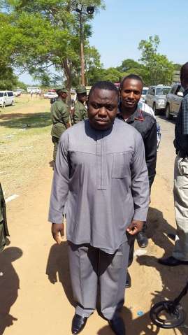 Security check is thorough. Here Minister of Foreign Affairs, Harry Kalaba goes through metal detectors.
