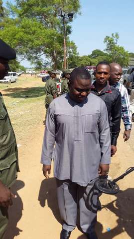 Security check is thorough. Here Minister of Foreign Affairs, Harry Kalaba goes through metal detectors.