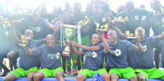 ZESCO United players celebrate after winning the 2014 Barclays Cup yesterday at Levy Mwanawasa Stadium in Ndola. Zesco beat Nkana 3-0 to lift the Barclays Cup for the fourth time. Picture by DAVID KANDUZA
