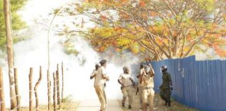 Zambia police officers run for their lives after UNZA monks ambushed them with stones UNZA Network
