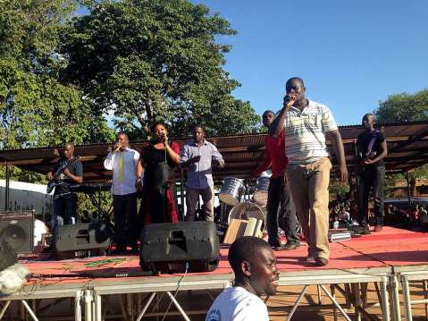 Mathew Ngosa singing at the rally