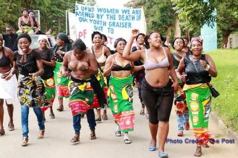 UPND women Feb 27th 2015 marched half-naked on the streets of Lusaka to demonstrate against the killing of their party member, Grayzer Matapa - Photo Credit : The Post