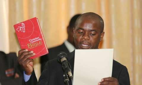 Acting President Ngosa Simbyakula swears in Permanent Secretaries at State House on March 13,2015 -PICTURES BY THOMAS NSAMA AND EDDIE MWANALEZA