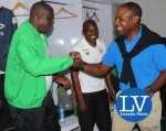 FAZ President Kalusha Bwalya congratulating ZESCo coach George Lwandamina - Photo Credit Jean Mandela - Lusakavoice.com