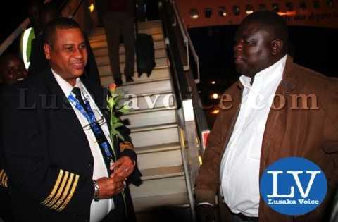 Minister of Transport and Communication Christopher Yaluma greeting the Rwandair Director of Flight Operations Santos Pio after landing     - Photo Credit Jean Mandela - Lusakavoice.com