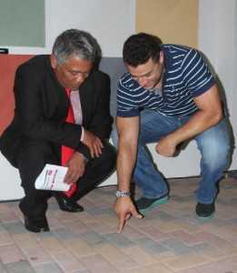 Oriental Director Ahmed Saadi with Minister Given  Lubinda admiring Oriental products.