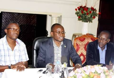 Special Assistant to the President for Press and Public Relations Amos Chanda addresses Journalists at State House. Seated next to him are State House permanent Secretary Emmanuel Chilubanama (l) and Special Assistant to the President for Political affairs Kaiza Zulu (r) on March 9,2015 -Picture by THOMAS NSAMA