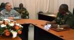 U.S. Army Africa Deputy Commanding General, Brig. Gen. Peter L. Corey engages with Lt. Gen. Paul Mihova, commander of the Zambian Army during a meeting at the Zambian Ministry of Defense.