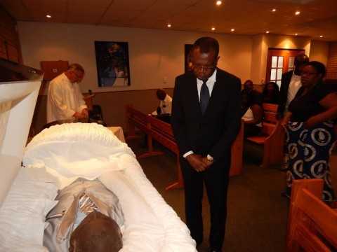 Zambia's High Commissioner to South Africa, His Excellency Mr. Muyeba Chikonde pays his last respects