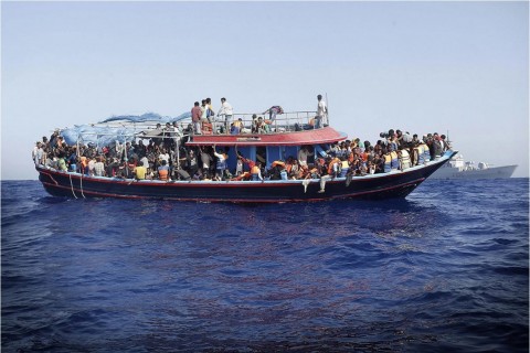 More than 900 illegal migrants are shipped to the mainland after being rescued by Italian Navy boat “Fregata Euro” in the Mediterranean Sea on Sept. 12, 2014. (GIUSEPPE LAMI/EPA)