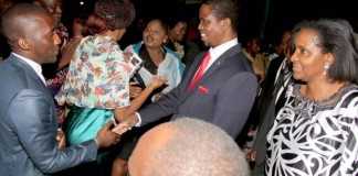 President Edgar Chagwa Lungu greets Zambians at Zambia's Ambassador to Zimbabwe's residence in Harare where he addressed them on April 29,2015 -Picture by THOMAS NSAMA