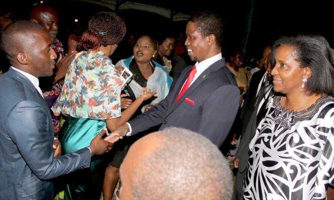 President Edgar Chagwa Lungu greets Zambians at Zambia's Ambassador to Zimbabwe's residence in Harare where he addressed them on April 29,2015 -Picture by THOMAS NSAMA