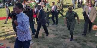 Republican President Edgar Chagwa Lungu jogging back to the Presidential Podium after he went down to the Tents to greet the People of Masaiti at the Masaiti Boma.